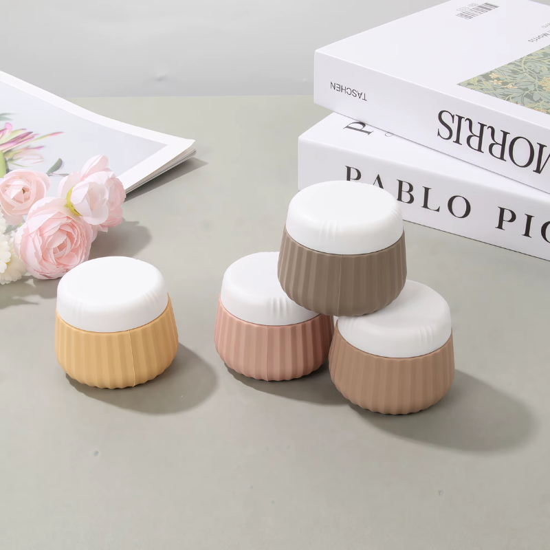 Flacon Vide Voyage pour Crème quatre flacons empilés - Beige - Rose - Vert - Bleu - Multicouleur