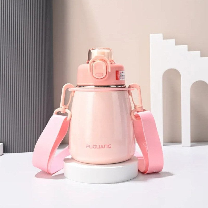 Gourde inox enfant rose avec bandoulière, vue de face