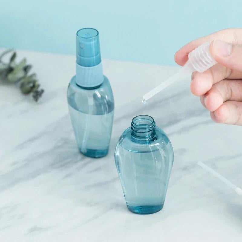 kit voyage flacon vide - Bleu